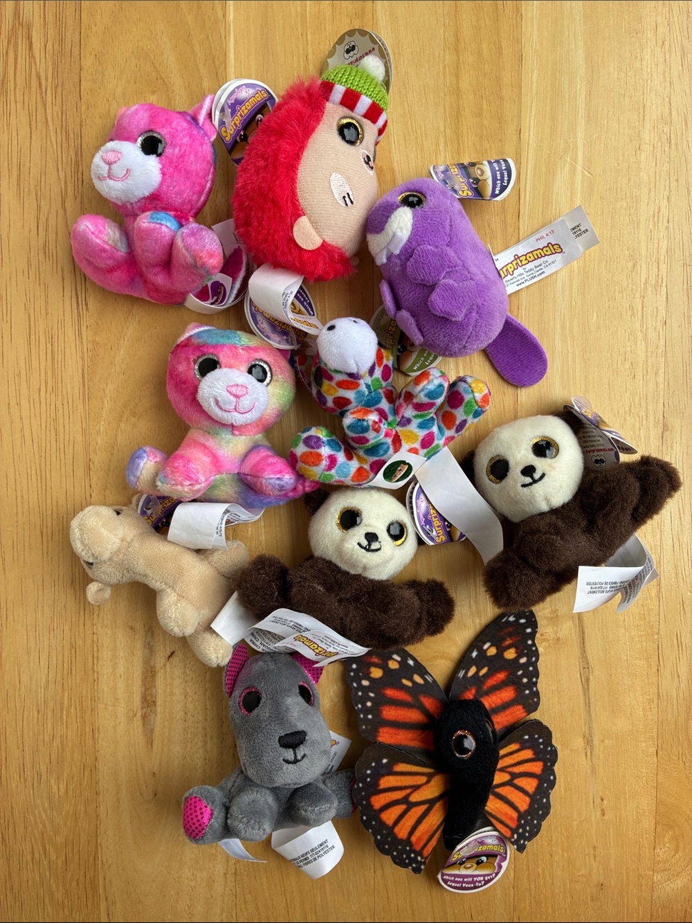Surprizamals (open -so not a surprise) lot of 12 (2 added- no pic) but with tags
